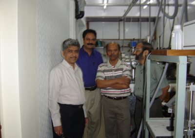 Professor Misra with Professor Hosur, Professor Wategaonkar and Dean Kurup at TIFR (2005)
