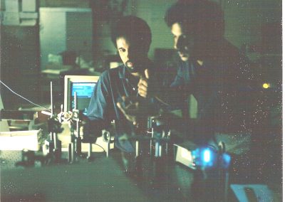 Professor Misra with Dr. Abdullahi H. Nur aligning the ultraviolet beam
