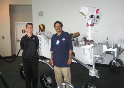 Diane Pugel and Prof. Misra posing with the Curiosity rover model.