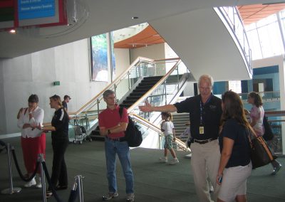 Dave Martin and Diane Pugel conversing with the exhibition attendees