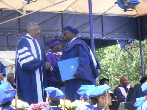 Dr. Ogungbemi Kayode receiving his Ph.D diploma from Mr. Addisson Barry Rand, Chairman of the Board of Trustees, Howard University, 2010 at the 142nd Convocation.