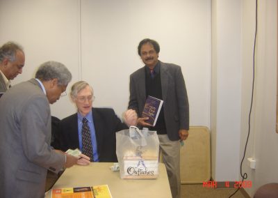 Dr. Misra with a personalized signed copy of Dr. Mather’s book “The very first light” at the Book Signing Ceremony preceding the Howard University Colloquium given by the Nobel prize winner