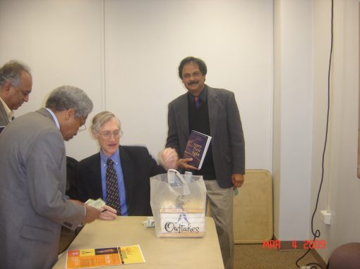 Dr. Misra with a personalized signed copy of Dr. Mather’s book “The very first light” at the Book Signing Ceremony preceding the Howard University Colloquium given by the Nobel prize winner