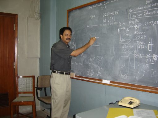 Professor Misra at the blackboard in his office at TIFR (2005)